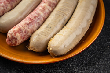 raw sausages pork, beef, chicken, lamb fresh tasty food dish delicious gourmet food background on the table rustic food top view copy space