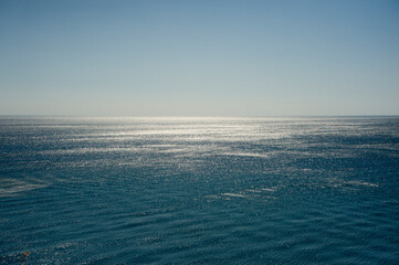 Blue sea and sky on a sunny afternoon.