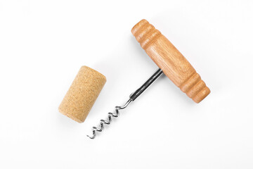 Corkscrew and cork on white background, top view