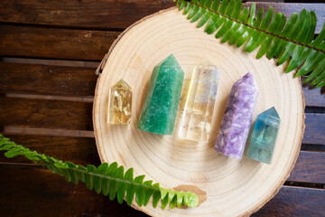 Healing crystals on brown background