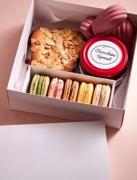 Delicious Selection of Authentic Pastries and Macarons in a Beautifully Arranged Box