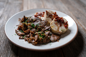 Sautéed Liver Served with a Bread Dumpling Topped with Crispy Pork Cracklings