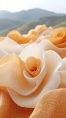 Fototapeta premium Close-up of delicate, layered, peach-colored rose flowers, soft, floral design, fabric, texture, decorative.