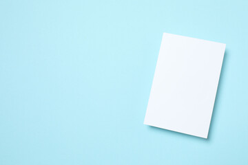 White paper card on color background