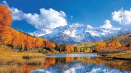 A mountain range is reflected in the water of a lake