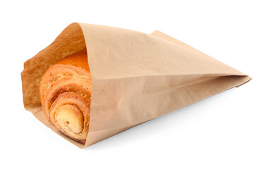 Paper bag with freshly baked bun isolated on white