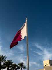 Qatar Flag waving on a beautiful sunny day