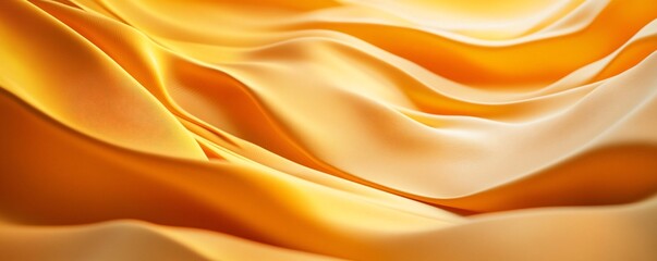 Golden silk fabric flowing and forming elegant waves
