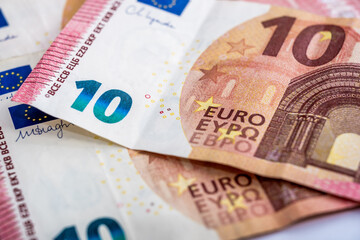 Close-Up of Euro Banknotes Featuring 10 Euro Bills with European Union Flag