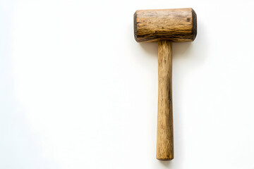Wooden mallet resting on a white surface with minimalistic design