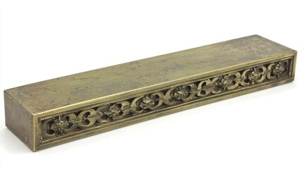 A decorative, elongated brass piece featuring intricate floral carvings, likely serving as an incense holder or ornamental object.