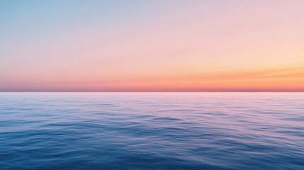 Obraz premium Calm ocean reflecting beautiful sunset colors in a serene landscape