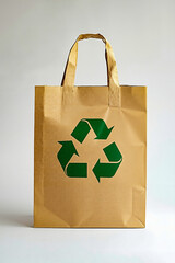 A brown paper bag with a green recycling symbol on it
