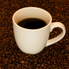 cup of coffee with beans