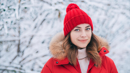 Pretty Woman Wearing a Red Coat and Beanie