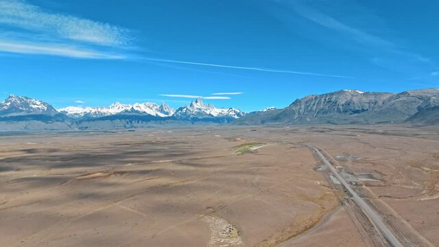 Andean Giants and Winding Roads Journey through the heart of the Argentinian Andes, where snow-covered giants watch over a tapestry of fields and a ribbon of road. 12.01.2025