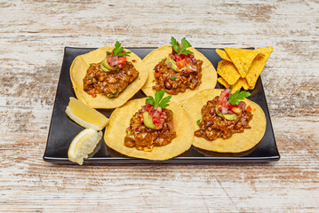 Made with pork slowly cooked until it is soft and shredded