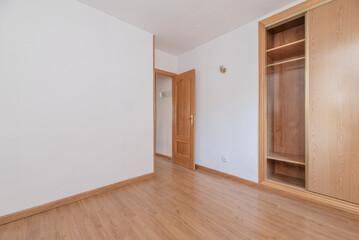  versatility allows the built-in wardrobe to be incorporated as an essential part of the bedroom's decor,