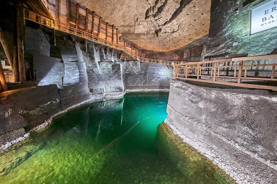 Underground lake deep down in the 13th century Wieliczka Salt Mine which is one of the world's oldest salt mines, Wieliczka, Poland, Europe