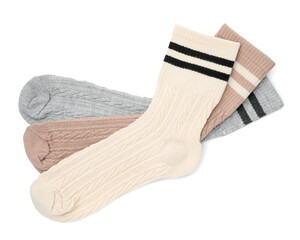 Different soft socks isolated on white, top view