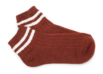 Pair of soft socks isolated on white, top view