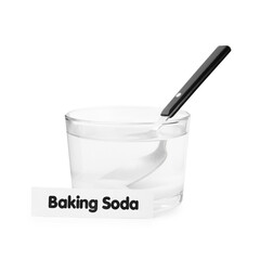 Glass of water with baking soda and spoon isolated on white