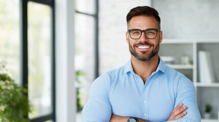Confident business professional smiling in a modern workspace with natural light and greenery in the background
