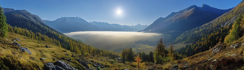 Obraz premium Panoramic view of the mountain peaks at sunrise