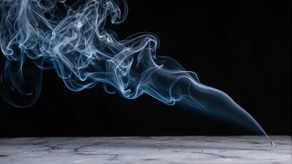 Ethereal blue and silver smoke swirls gracefully from incense on marble resembling fluid in mesmerizing motion