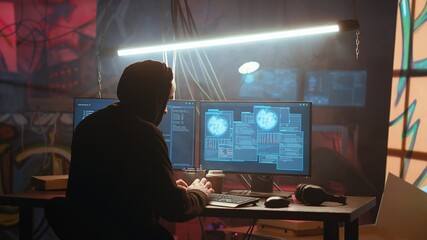 Hacker using high tech computer system to run malicious code in foggy dark basement. Rogue programmer committing illegal activities using PC in neon illuminated criminal hideout, camera B