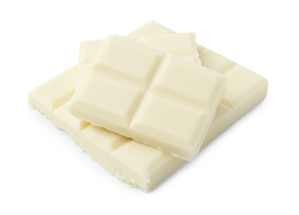 Pieces of delicious white chocolate isolated on white