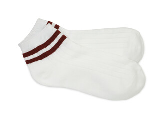 Pair of soft socks isolated on white, top view