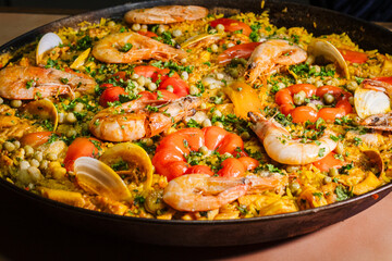 Restaurant food. Various dishes. Clubhouse, pizza, sushi. Traditional food. Fast food. Hamburger. Paella