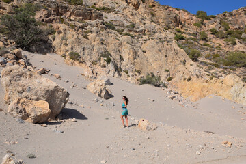 Girl walking on the sand