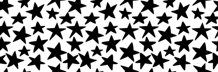 Fototapeta premium Seamless pattern with hand-drawn doodle stars.