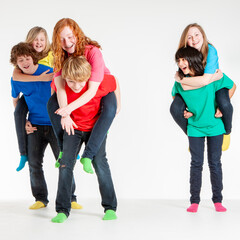 Early Teens: Messing About. A group of early teenage friends messing about in a carefree mood.