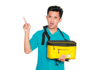 Asian man holding camera sling bag pointing to right isolated on white background