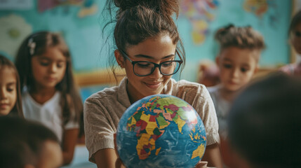 Engaging teacher holding globe, explaining geography to students