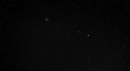 Night sky with stars sparkling on black background
