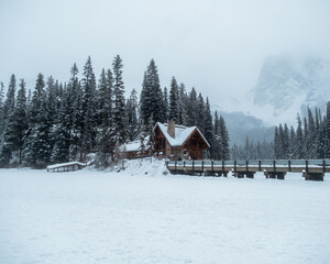 cabin on frozen lake