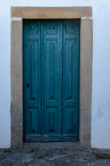 Fototapeta premium Blue wooden exterior door, city of Castelo Branco-Portugal.