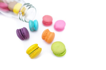 Fresh colorful macarons isolated on white background