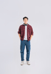 Fototapeta premium Full body image of young dynamic Asian man posing on white backgroundmage