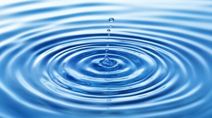 Bluewater waves on the surface ripples blurred. Defocus blurred transparent blue colored clear calm water surface texture with splash and bubbles. Water waves with shining pattern texture background.