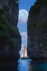 Sailing Gracefully Through the Serene Rock Formations Beneath the Glowing Moonlight