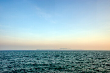 blue sea with blue sky scene