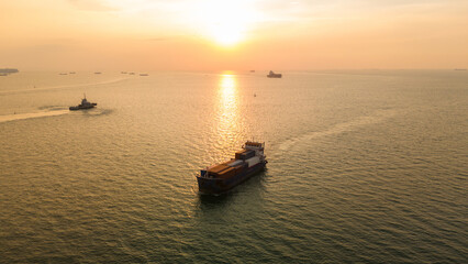 Aerial side view of cargo ship carrying container and running for export cargo yard port to custom ocean concept technology transportation , customs clearance, webinar banner forwarder mast