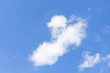 White clouds in the blue sky.  background