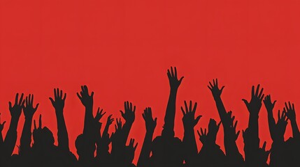 Silhouetted hands raised high against a red background