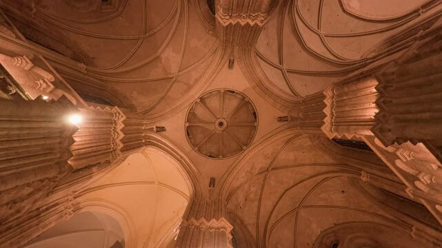 A stunning upward view of Saint-Nicolas Church's intricate Gothic ceiling in Blois
